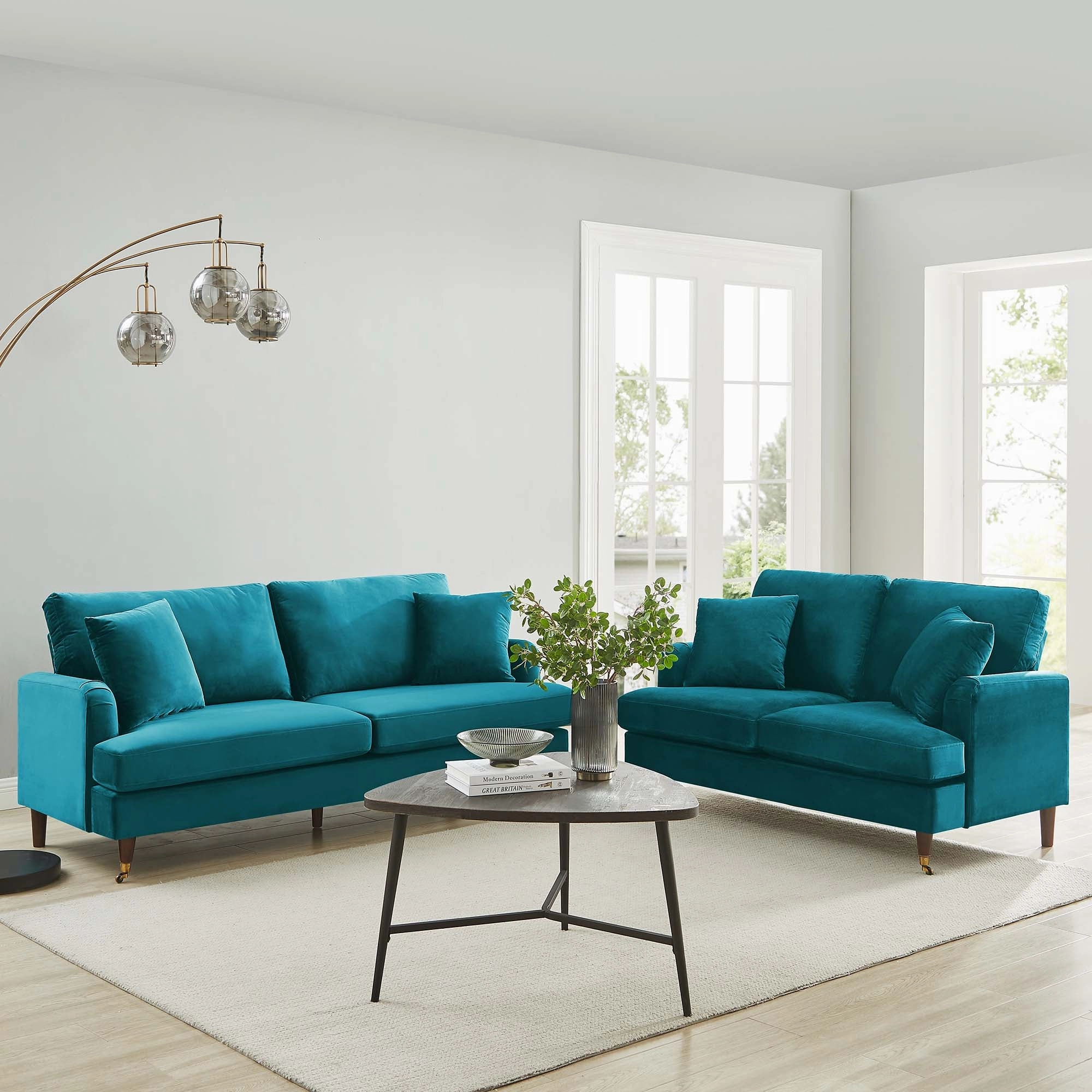 Brigette 3-Seater Teal Velvet Sofa with Antique Brass Castor Legs