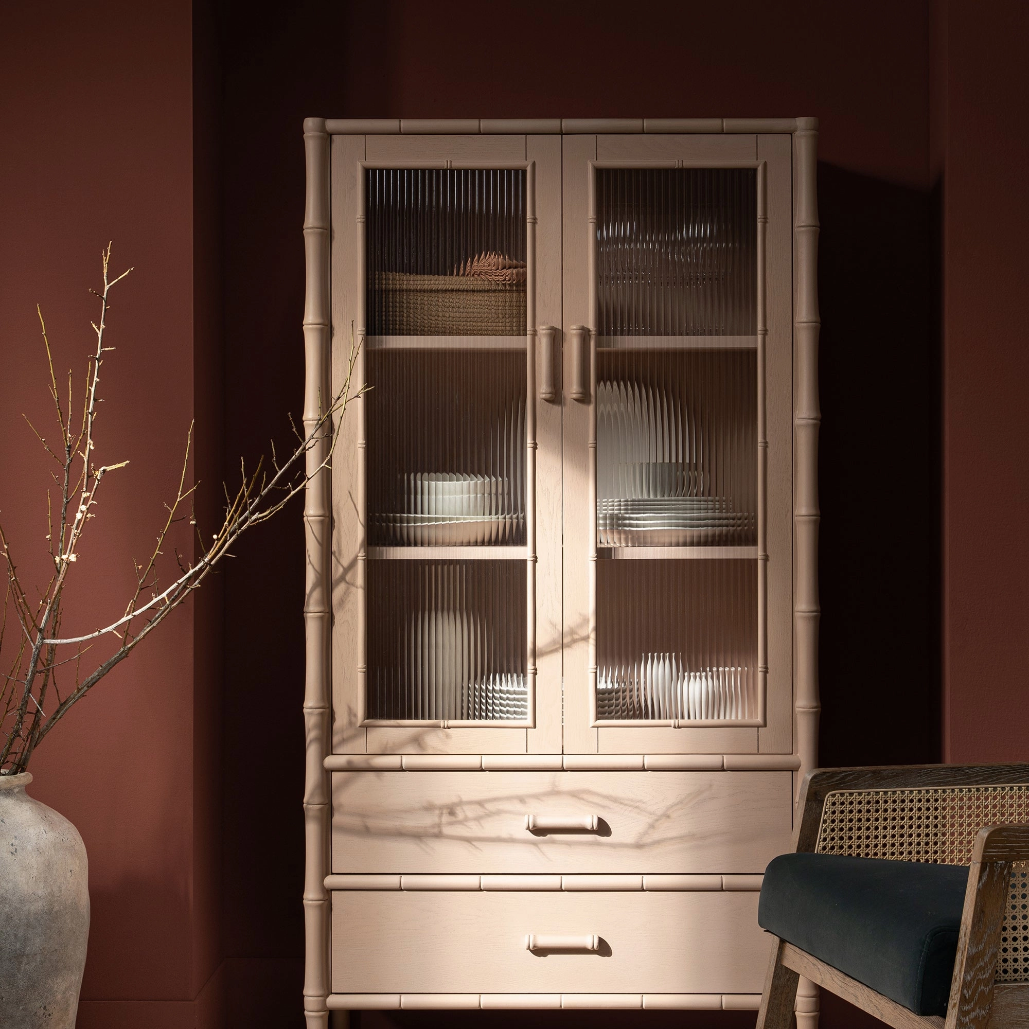 Elstowe Faux Bamboo and Fluted Glass 2-Door Cabinet, Nude Pink