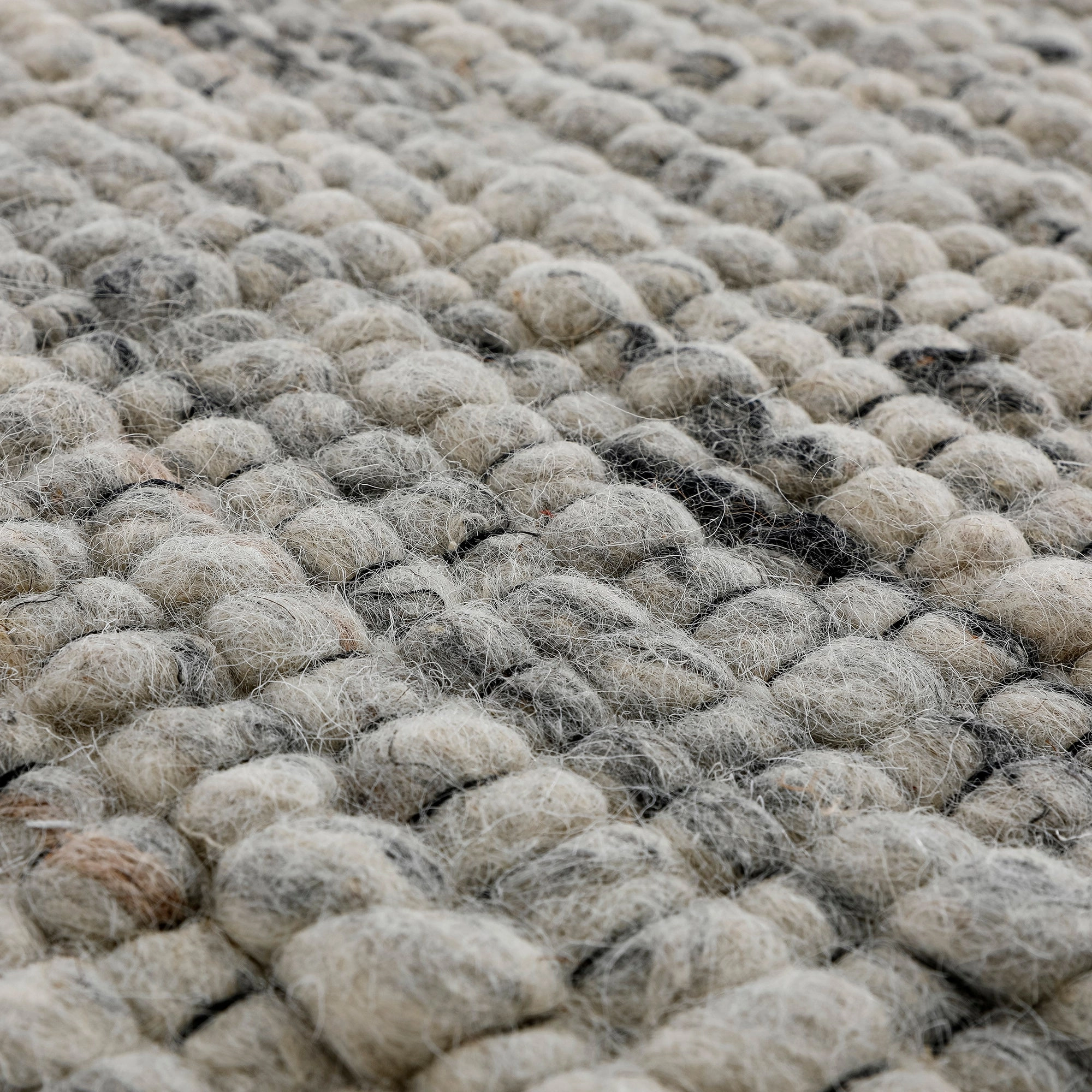 Indra Dark Grey Handwoven Wool Round Rug
