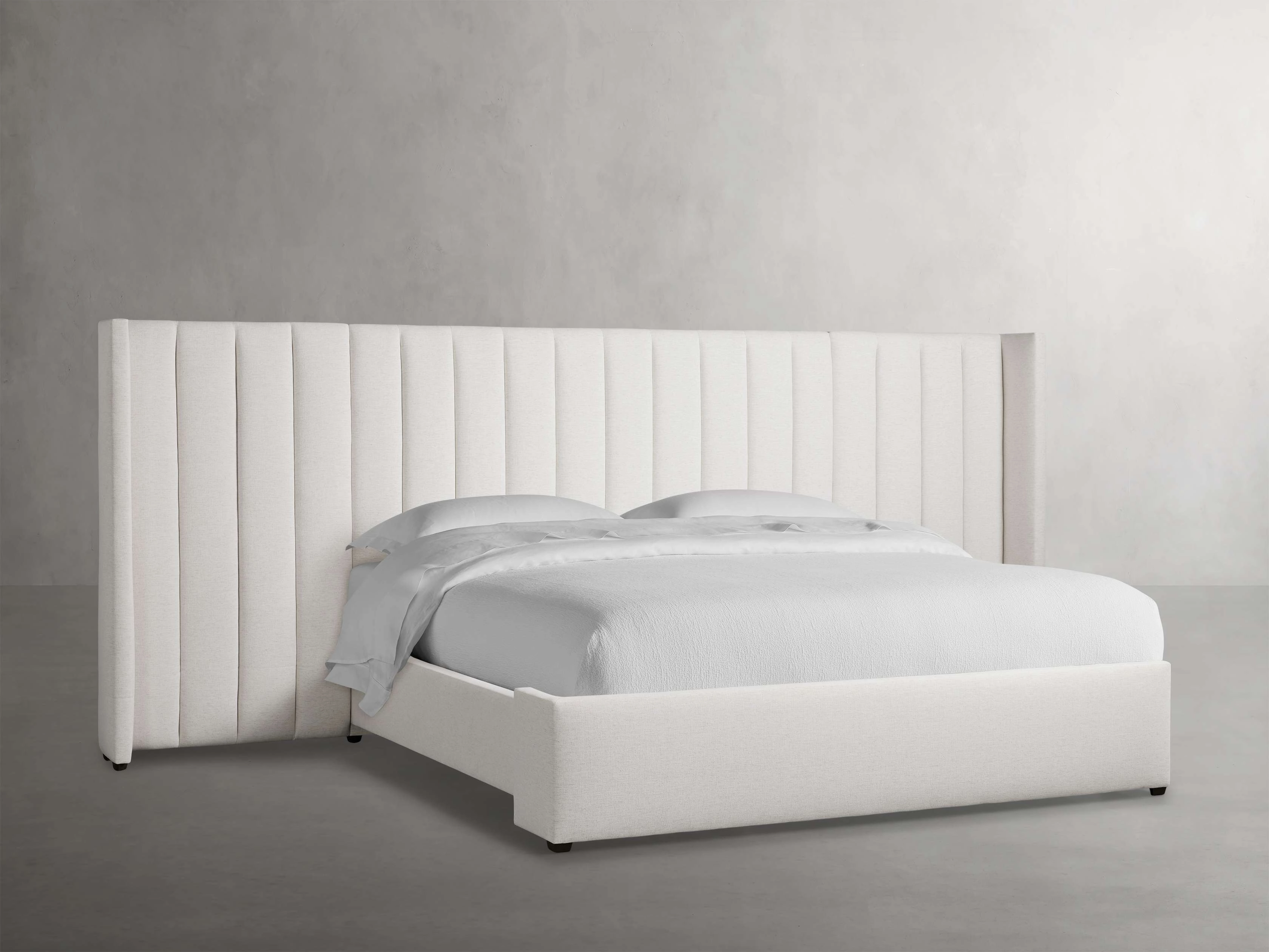 Wyller Channel-Stitched Extended Headboard Bed with Low Footboard
